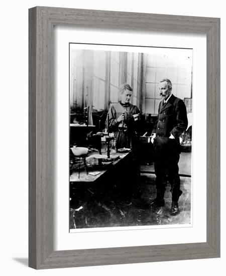 Pierre (1859-1906) and Marie Curie (1867-1934) in their Laboratory, c.1900-Valerian Gribayedoff-Framed Giclee Print