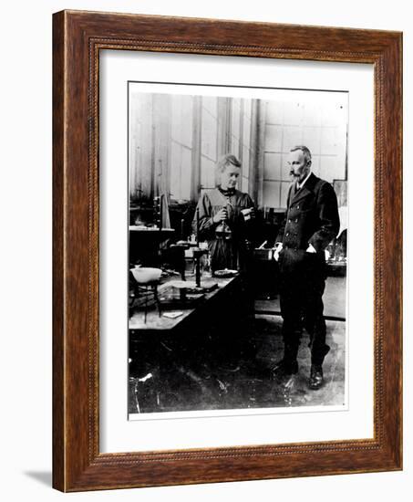 Pierre (1859-1906) and Marie Curie (1867-1934) in their Laboratory, c.1900-Valerian Gribayedoff-Framed Giclee Print