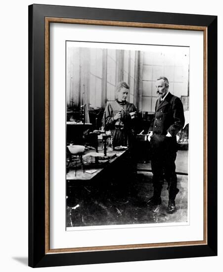 Pierre (1859-1906) and Marie Curie (1867-1934) in their Laboratory, c.1900-Valerian Gribayedoff-Framed Giclee Print