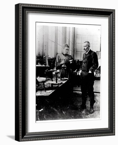 Pierre (1859-1906) and Marie Curie (1867-1934) in their Laboratory, c.1900-Valerian Gribayedoff-Framed Giclee Print