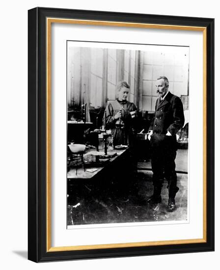 Pierre (1859-1906) and Marie Curie (1867-1934) in their Laboratory, c.1900-Valerian Gribayedoff-Framed Giclee Print