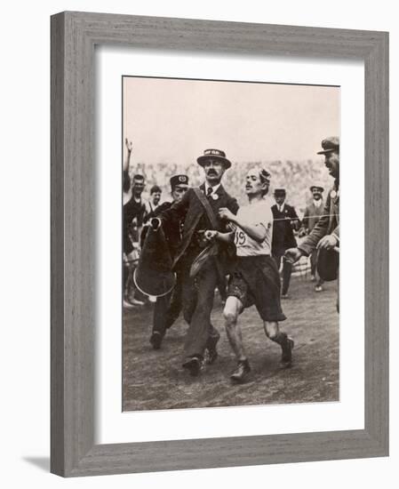 Pietri Dorando of Italy Wins the Marathon from Windsor to the Olympic Stadium-null-Framed Photographic Print