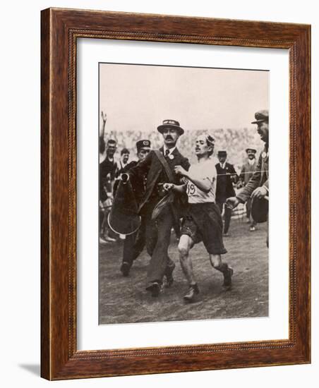 Pietri Dorando of Italy Wins the Marathon from Windsor to the Olympic Stadium-null-Framed Photographic Print