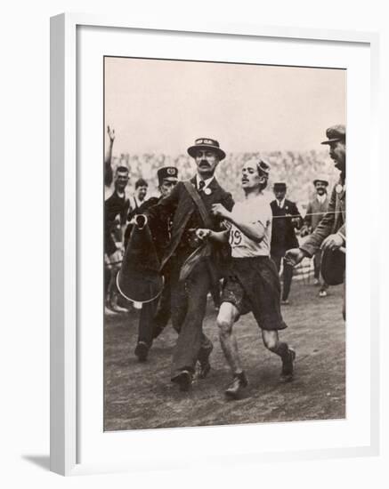 Pietri Dorando of Italy Wins the Marathon from Windsor to the Olympic Stadium-null-Framed Photographic Print