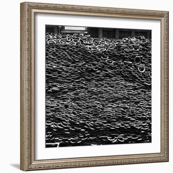 Pile of New and Used Tires over 40 Feet Deep at the B.F. Goodrich Yard-William C^ Shrout-Framed Photographic Print