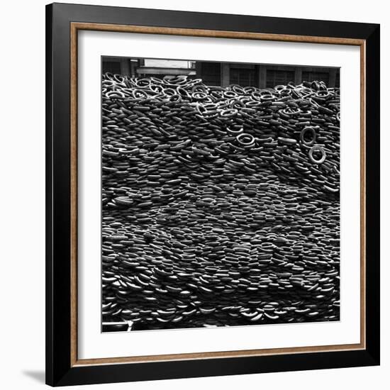 Pile of New and Used Tires over 40 Feet Deep at the B.F. Goodrich Yard-William C^ Shrout-Framed Photographic Print