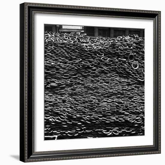 Pile of New and Used Tires over 40 Feet Deep at the B.F. Goodrich Yard-William C^ Shrout-Framed Photographic Print