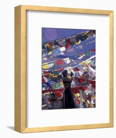 Pilgrim Praying Among Flags, Tibet-Keren Su-Framed Photographic Print