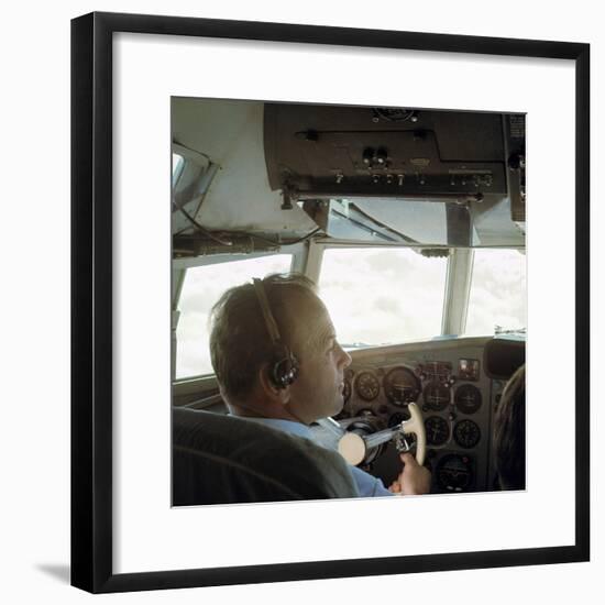 Piloting an Illyusin 18 Airliner-Unknown-Framed Photographic Print