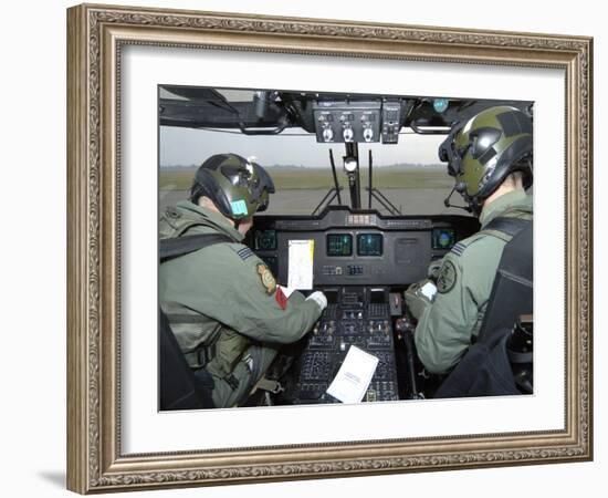 Pilots Inside the Cockpit of a Royal Air Force Merlin Helicopter at RAF Lyneham-Stocktrek Images-Framed Photographic Print