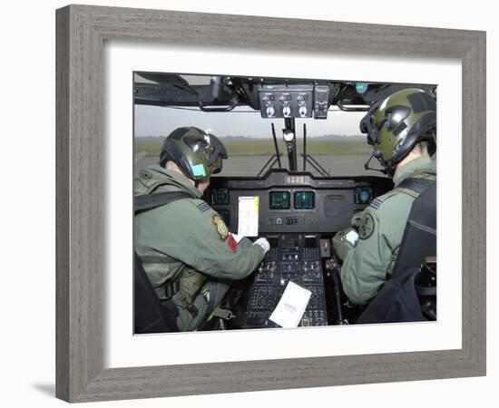 Pilots Inside the Cockpit of a Royal Air Force Merlin Helicopter at RAF Lyneham-Stocktrek Images-Framed Photographic Print