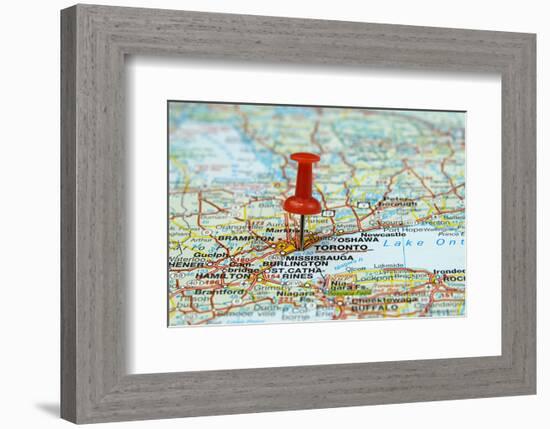 Pin Pointing At Toronto Canada-null-Framed Art Print