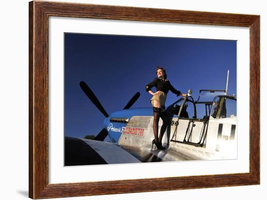 Pin-Up Girl Standing on the Wing of a P-51 Mustang-null-Framed Photographic Print