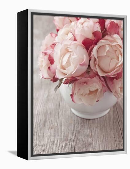 Pink Roses on Wooden Desk-egal-Framed Premier Image Canvas