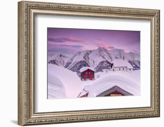 Pink Sky at Sunset Frames the Snowy Mountain Huts and Church, Bettmeralp, District of Raron-Roberto Moiola-Framed Photographic Print