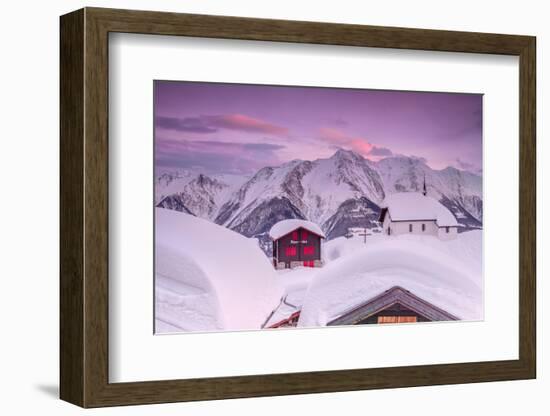 Pink Sky at Sunset Frames the Snowy Mountain Huts and Church, Bettmeralp, District of Raron-Roberto Moiola-Framed Photographic Print