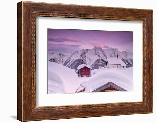 Pink Sky at Sunset Frames the Snowy Mountain Huts and Church, Bettmeralp, District of Raron-Roberto Moiola-Framed Photographic Print