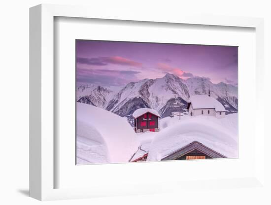 Pink Sky at Sunset Frames the Snowy Mountain Huts and Church, Bettmeralp, District of Raron-Roberto Moiola-Framed Photographic Print