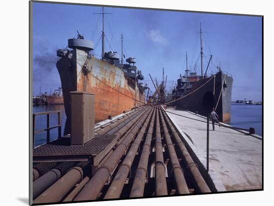 Pipeline Running to Loading Pier at Oil Refinery-Dmitri Kessel-Mounted Photographic Print