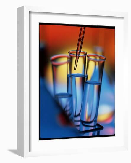 Pipette Places a Solution In a Test Tube-Tek Image-Framed Photographic Print