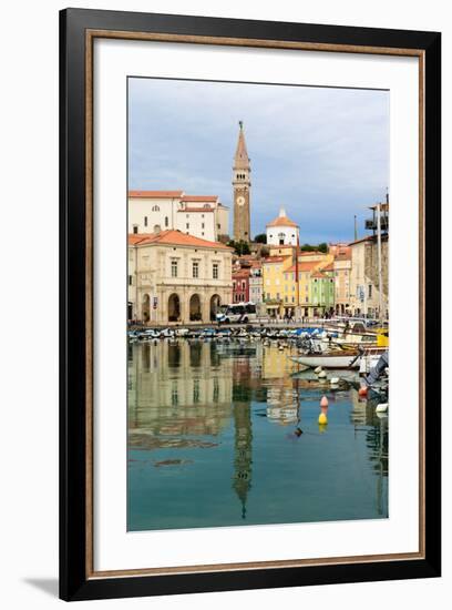 Piran, Primorska, Slovenia. View across harbour to Tartinijev trg (or square) and the spire of S...-null-Framed Photographic Print