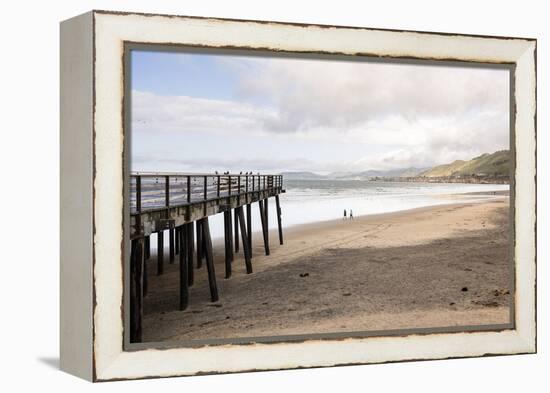 Pismo Beach Pier, California, USA: A Man And A Woman Walking Along The Beach-Axel Brunst-Framed Premier Image Canvas