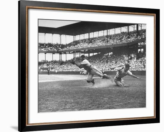 Pittsburgh Player Sliding to Home Plate before St. Louis Cardinal Catcher Gets the Ball-Joe Scherschel-Framed Premium Photographic Print