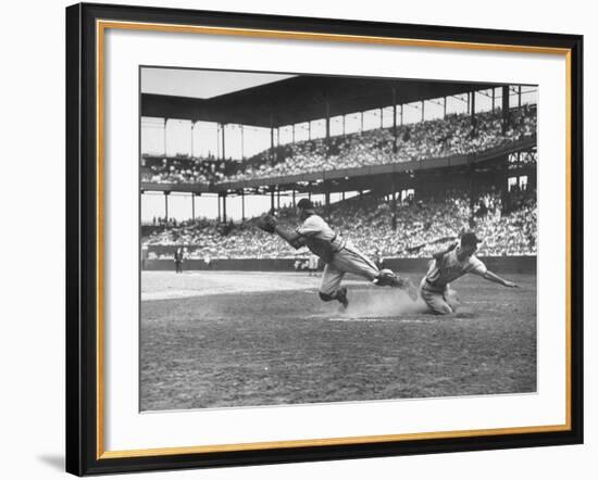 Pittsburgh Player Sliding to Home Plate before St. Louis Cardinal Catcher Gets the Ball-Joe Scherschel-Framed Premium Photographic Print