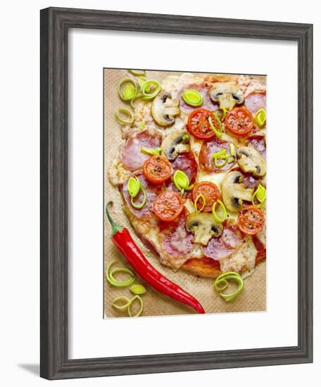 Pizza with Salami, Mushrooms, Tomatoes, Leek, Mozzarella and Chillis-Ira Leoni-Framed Photographic Print