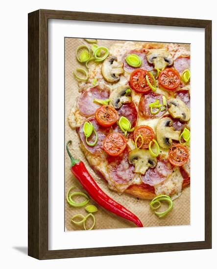 Pizza with Salami, Mushrooms, Tomatoes, Leek, Mozzarella and Chillis-Ira Leoni-Framed Photographic Print