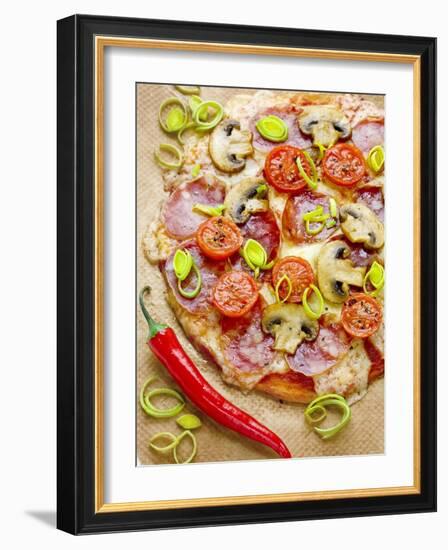 Pizza with Salami, Mushrooms, Tomatoes, Leek, Mozzarella and Chillis-Ira Leoni-Framed Photographic Print