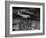 Plane Flying over a City from a Story Concerning United Airlines-Carl Mydans-Framed Photographic Print