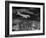 Plane Flying over a City from a Story Concerning United Airlines-Carl Mydans-Framed Photographic Print