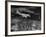 Plane Flying over a City from a Story Concerning United Airlines-Carl Mydans-Framed Photographic Print