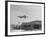Plane Landing at the Midway Airfield-null-Framed Photographic Print