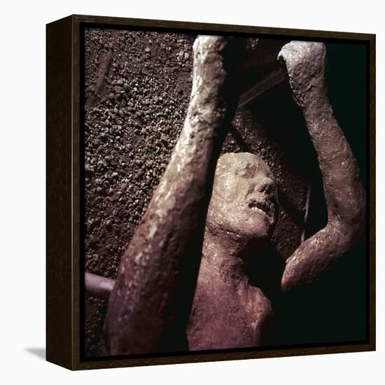 Plaster Cast of a victim of the eruption of Vesuvius at Pompeii, Italy. Artist: Unknown-Unknown-Framed Premier Image Canvas