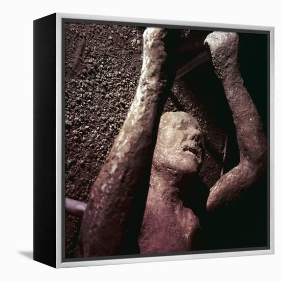 Plaster Cast of a victim of the eruption of Vesuvius at Pompeii, Italy. Artist: Unknown-Unknown-Framed Premier Image Canvas