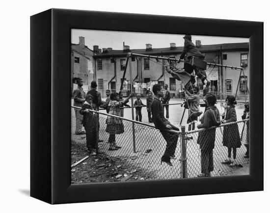 Playground Scene from the Slums of Baltimore-null-Framed Premier Image Canvas