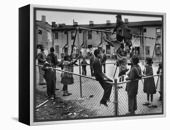 Playground Scene from the Slums of Baltimore-null-Framed Premier Image Canvas