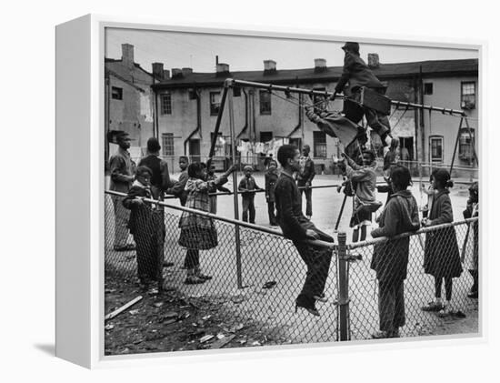 Playground Scene from the Slums of Baltimore-null-Framed Premier Image Canvas