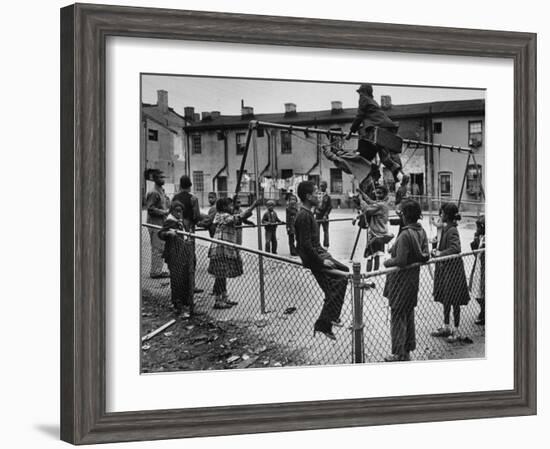 Playground Scene from the Slums of Baltimore-null-Framed Photographic Print