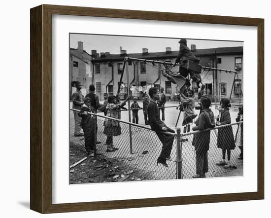 Playground Scene from the Slums of Baltimore-null-Framed Photographic Print