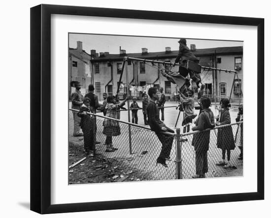Playground Scene from the Slums of Baltimore-null-Framed Photographic Print