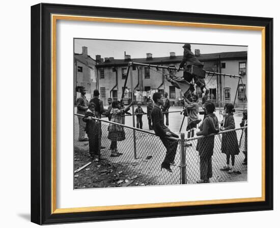 Playground Scene from the Slums of Baltimore-null-Framed Photographic Print