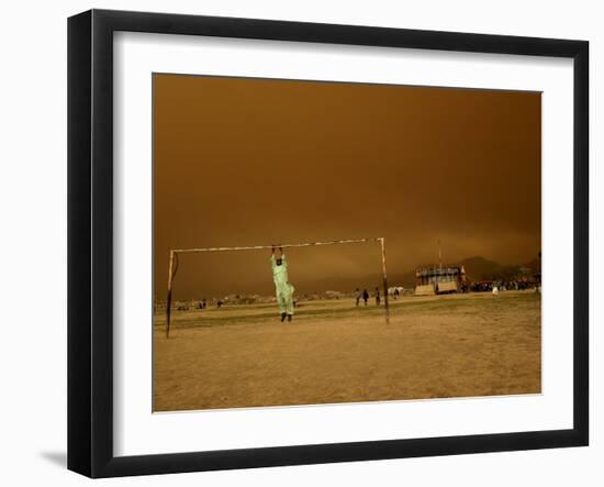 Playing a Friendly Soccer Match in a Park During a Sandstorm in Kabul, Afghanistan-null-Framed Photographic Print