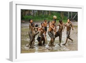 Playing Football-Angela Muliani Hartojo-Framed Photographic Print