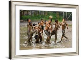 Playing Football-Angela Muliani Hartojo-Framed Photographic Print