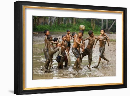 Playing Football-Angela Muliani Hartojo-Framed Photographic Print