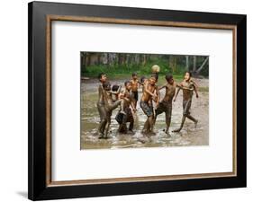 Playing Football-Angela Muliani Hartojo-Framed Photographic Print