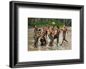 Playing Football-Angela Muliani Hartojo-Framed Photographic Print